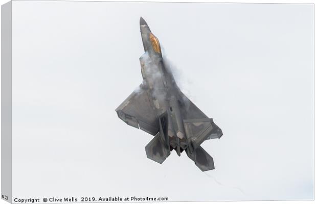F-22 Raptor pulling up hard at RAF Fairford Canvas Print by Clive Wells