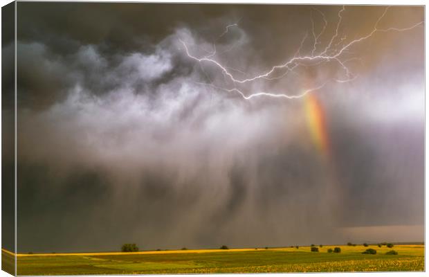 Lightning rainbow hail Canvas Print by John Finney