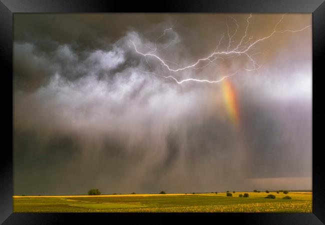 Lightning rainbow hail Framed Print by John Finney
