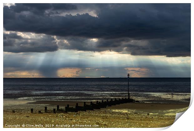 Dark skies over the Wash at Hunstanton Print by Clive Wells