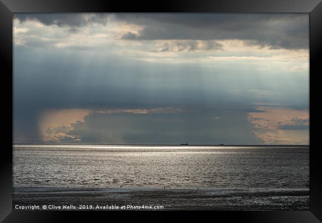 Bright skys over the sea at Hunstanton, Norfolk Framed Print by Clive Wells