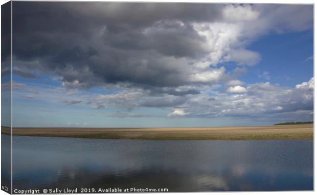 Heavy Skies over Calm Waters Canvas Print by Sally Lloyd