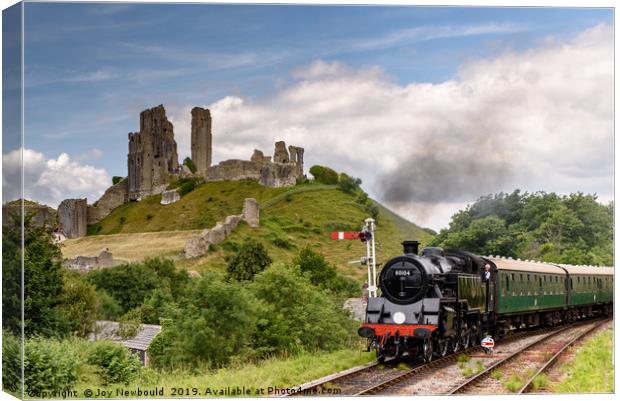 Steam Train passing Corfe Castle, Dorset Canvas Print by Joy Newbould