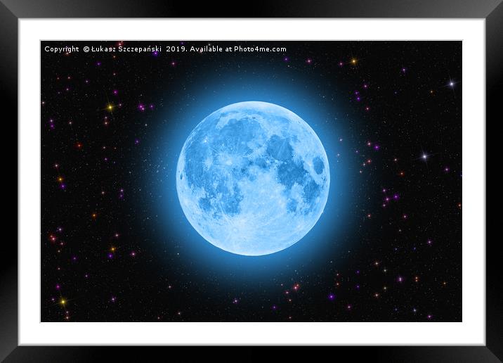 Blue super moon glowing against colorful starry sk Framed Mounted Print by Łukasz Szczepański