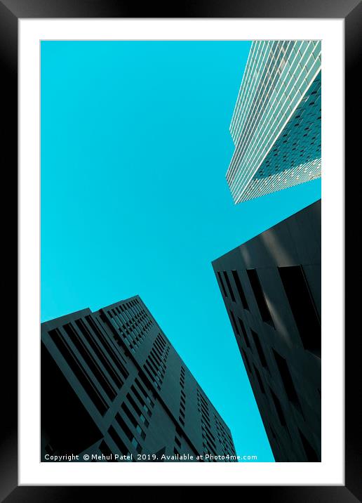 Tall skyscrapers against clear turquoise sky  Framed Mounted Print by Mehul Patel