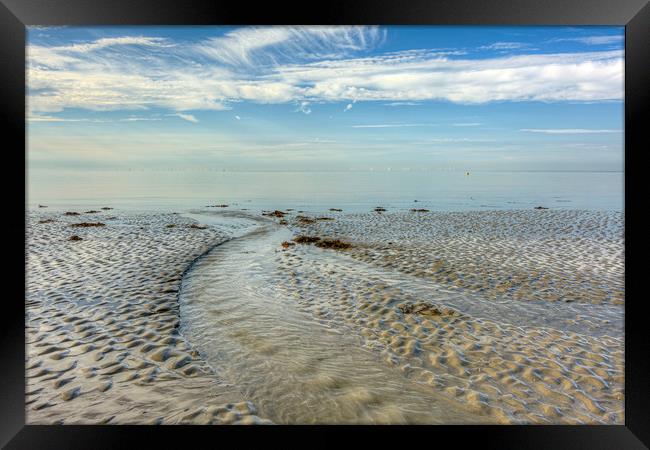 Flowing out to sea Framed Print by Malcolm McHugh