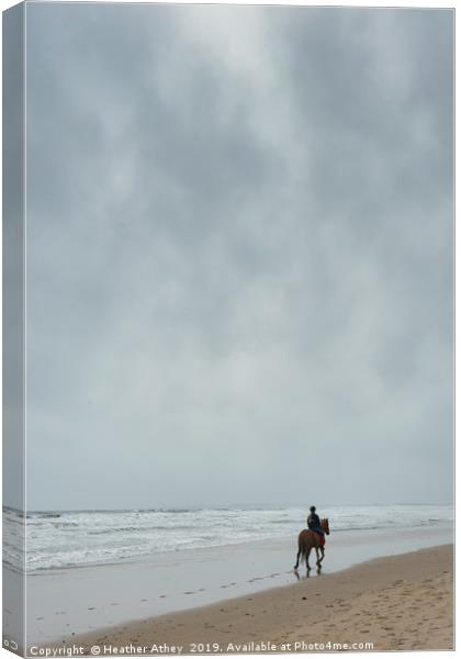 Rider in the Storm Canvas Print by Heather Athey
