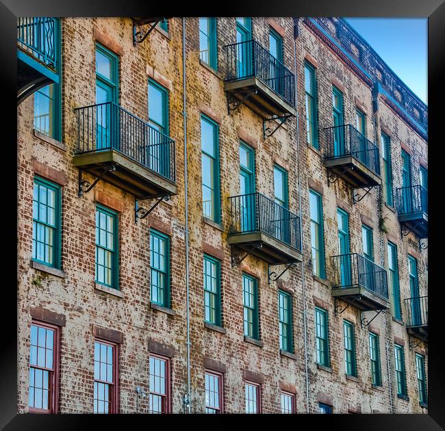 Old Brick Building with Red and Green Windows and Balconies Framed Print by Darryl Brooks