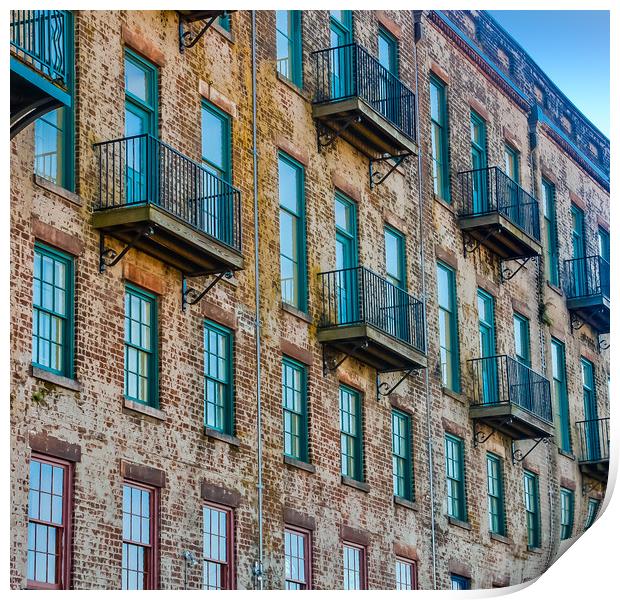 Old Brick Building with Red and Green Windows and Balconies Print by Darryl Brooks