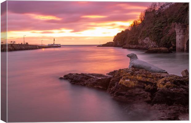 Sunrise in Looe Harbour at the Banjo pier Canvas Print by Jim Peters
