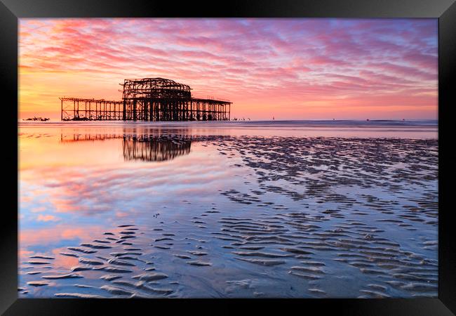 Sunrise over the West Pier (Brighton) Framed Print by Andrew Ray