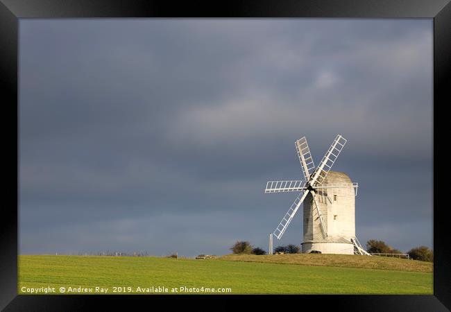 Stormy clouds behind Ashcombe Windmill Framed Print by Andrew Ray
