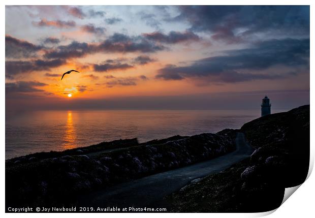 Sunset at Trevose Head Lighthouse, Cornwall Print by Joy Newbould