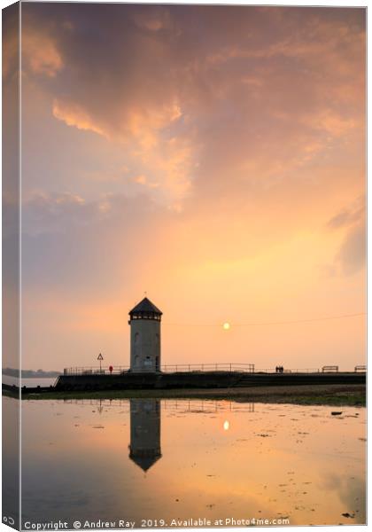 Setting sun at Batemans Tower (Brightlingsea) Canvas Print by Andrew Ray