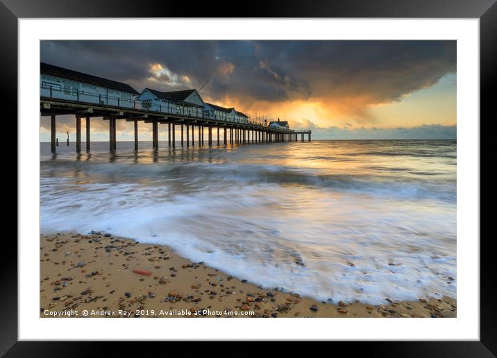 Stormy clouds at sunrise (Southwold Pier) Framed Mounted Print by Andrew Ray