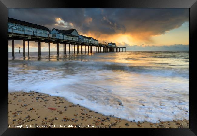 Stormy clouds at sunrise (Southwold Pier) Framed Print by Andrew Ray