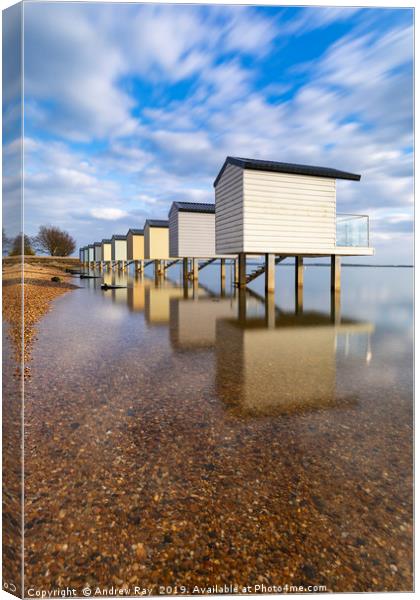 Osea Beach Hut reflections Canvas Print by Andrew Ray