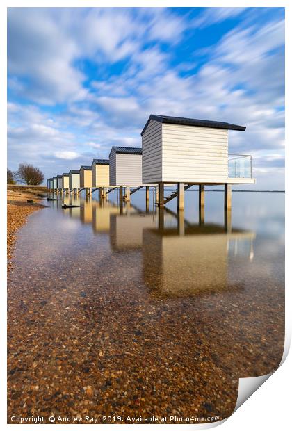 Osea Beach Hut reflections Print by Andrew Ray