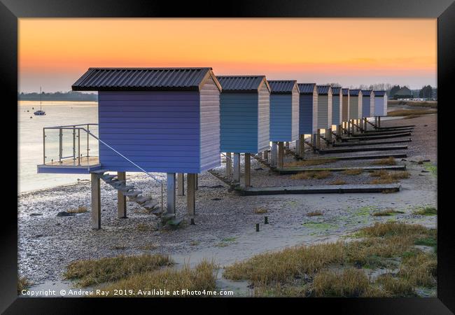 Osea Beach Huts at sunset Framed Print by Andrew Ray