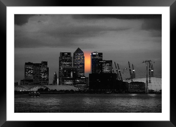 Sunset over Canary Wharf London  Framed Mounted Print by sylvia scotting