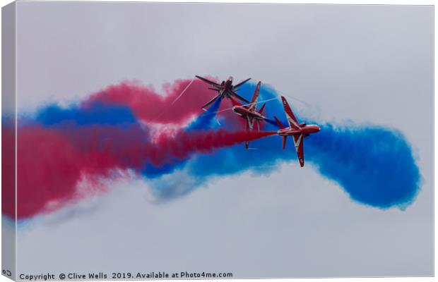 The Red Arrows seen at RAF Fairford Canvas Print by Clive Wells