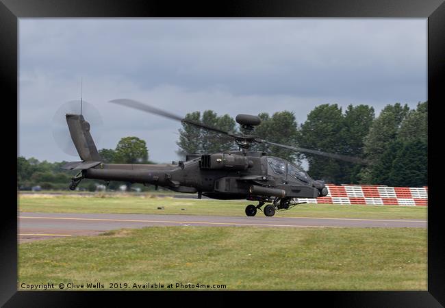 Apache Longbow taking off from RAF Fairford Framed Print by Clive Wells