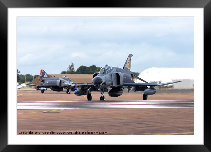 Both F-4E phantoms about to depart RAF Fairford Framed Mounted Print by Clive Wells
