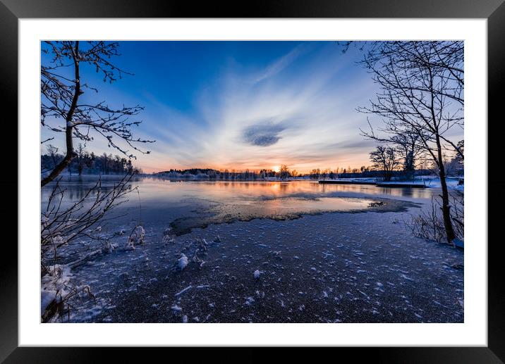 beautiful sunset over a cold lake in Sweden Framed Mounted Print by Jonas Rönnbro