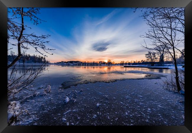 beautiful sunset over a cold lake in Sweden Framed Print by Jonas Rönnbro
