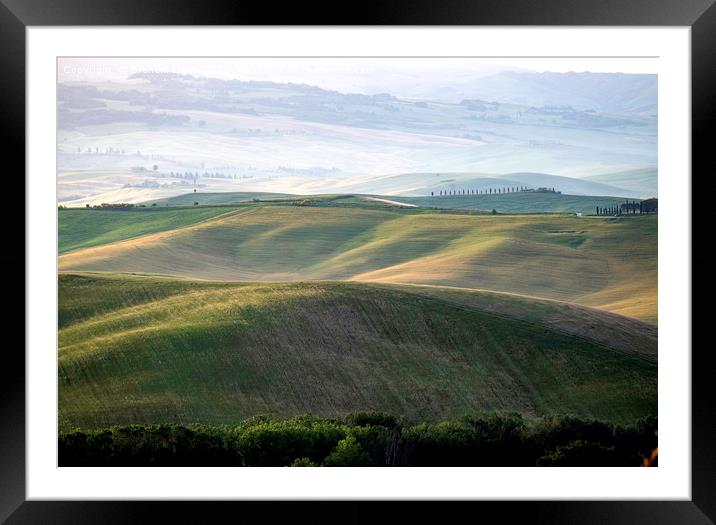 Early morning light on the rolling hills of Tuscan Framed Mounted Print by Graham Light