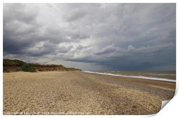 Stormy sky at Covehithe in Suffolk Print by Sally Lloyd