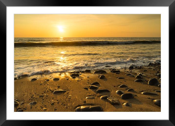 Sunlit pebbles on Westward Ho! beach at Sunset Framed Mounted Print by Tony Twyman