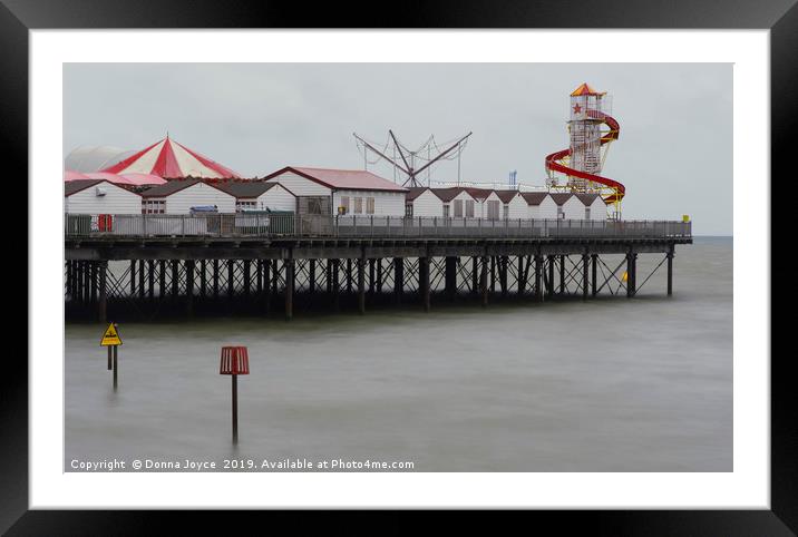 Colour pop pier Framed Mounted Print by Donna Joyce