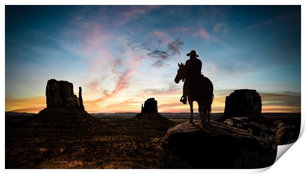 Silhouette of a cowboy at sunset Print by Guido Parmiggiani