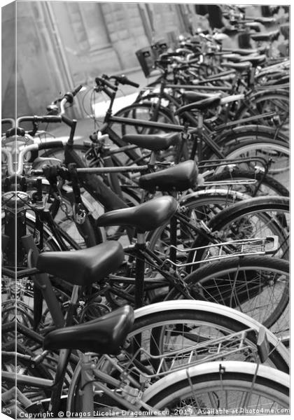 Row of bicycles black and white photography Canvas Print by Dragos Nicolae Dragomirescu