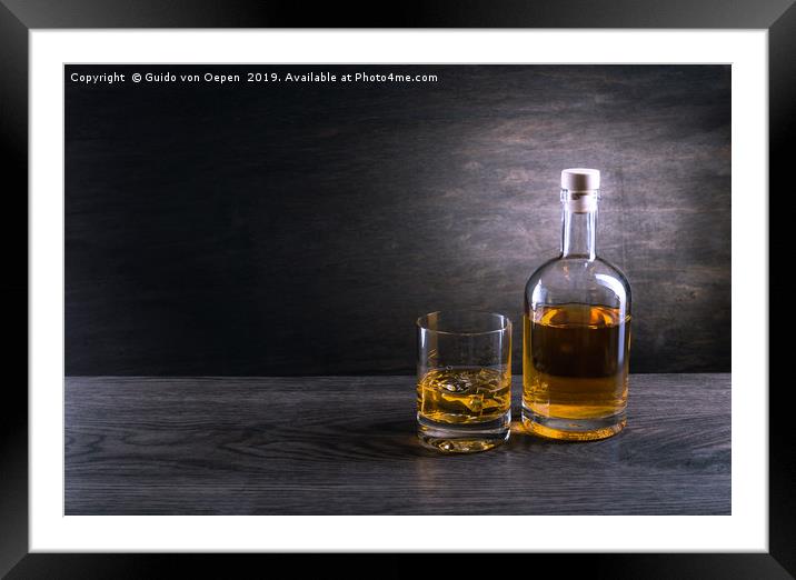 Whiskey with Bowler on a table Framed Mounted Print by Guido von Oepen