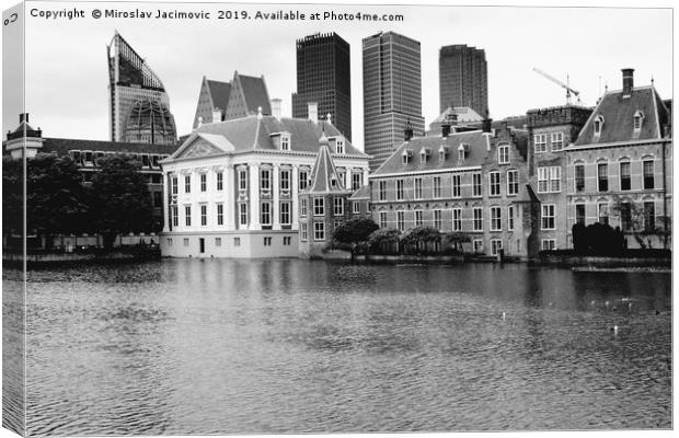 The Hague's Binnenhof with the Hofvijver  Canvas Print by M. J. Photography