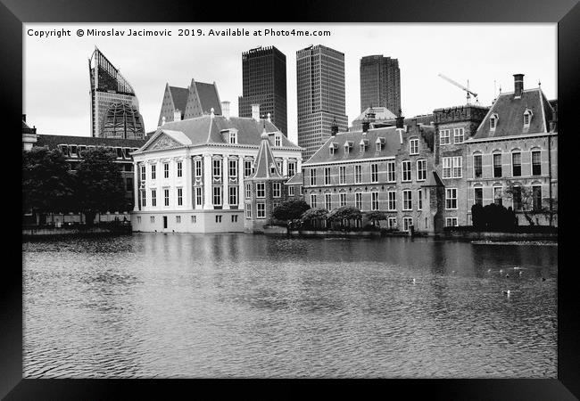 The Hague's Binnenhof with the Hofvijver  Framed Print by M. J. Photography
