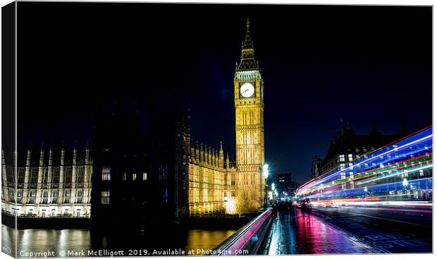 Big Ben London with travelling red bus flairs Canvas Print by Mark McElligott