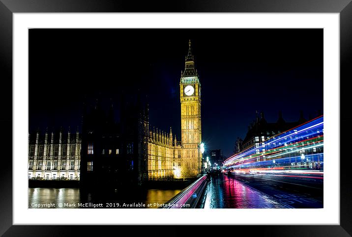 Big Ben London with travelling red bus flairs Framed Mounted Print by Mark McElligott