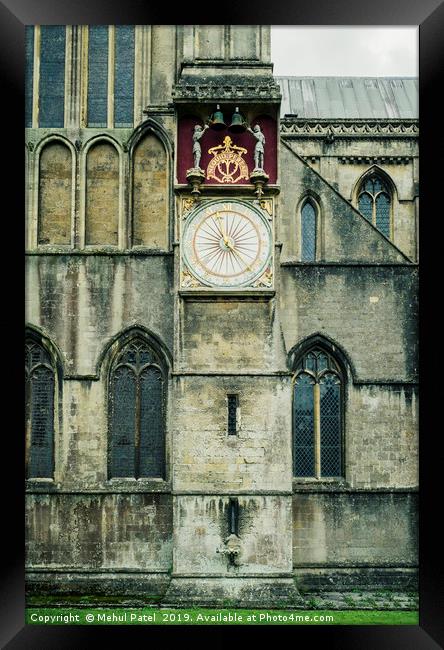 Clock on exterior wall of Wells Cathedral Framed Print by Mehul Patel