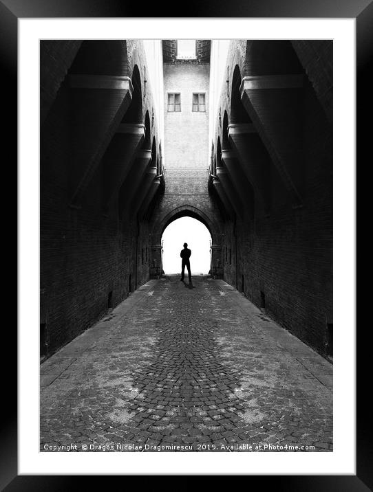 Narrow street gang with scary man silhouette Framed Mounted Print by Dragos Nicolae Dragomirescu