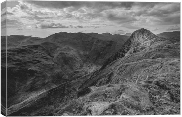 View of Pike o' Stickle and Crinkle Crags black Canvas Print by Greg Marshall