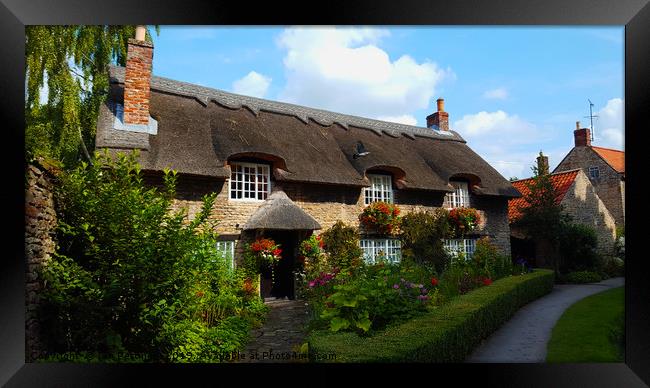 Thornton Le Dale Thatched Cottage Framed Print by Ian Pettman