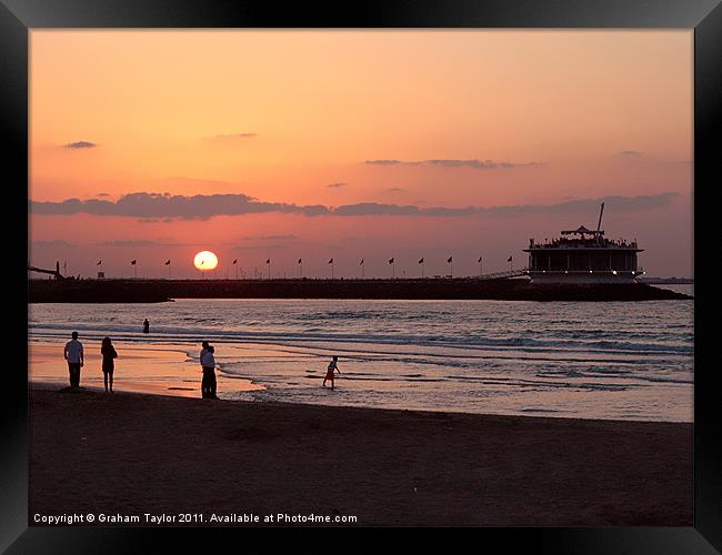 Sunset at Dubai Public Beach Framed Print by Graham Taylor