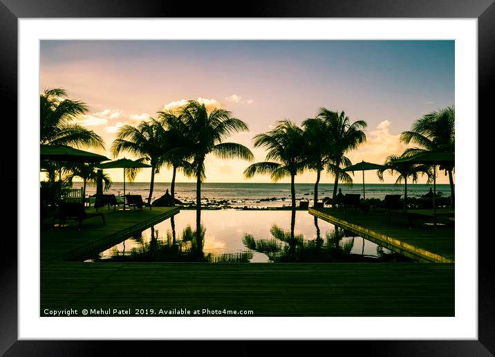 Infinity pool at resort in Mauritius during sunset Framed Mounted Print by Mehul Patel