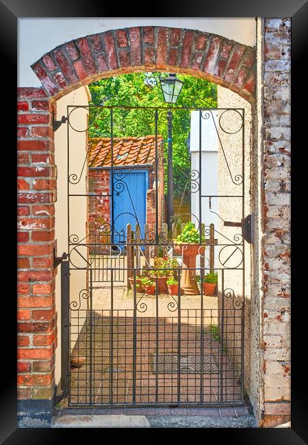Through the gate into the sunshine Framed Print by Hugh McKean