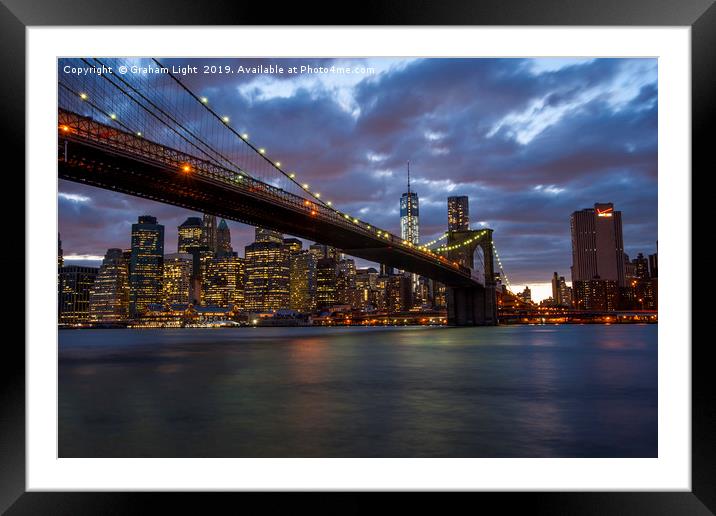 Manhattan and Brooklyn Bridge at night Framed Mounted Print by Graham Light