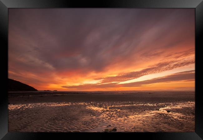 Sunset at Sandbay in North Somerset Framed Print by Tony Twyman
