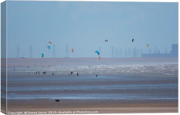 Kite surfers at Camber Sands Canvas Print by Donna Joyce